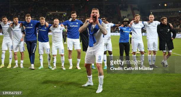 Phillip Tietz and his teammates of SV Darmstadt 98 celebrate their sides victory after the Second Bundesliga match between FC St. Pauli and SV...