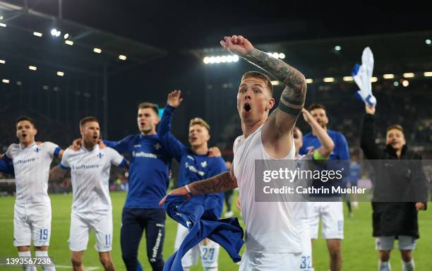 Phillip Tietz and his teammates of SV Darmstadt 98 celebrate their sides victory after the Second Bundesliga match between FC St. Pauli and SV...