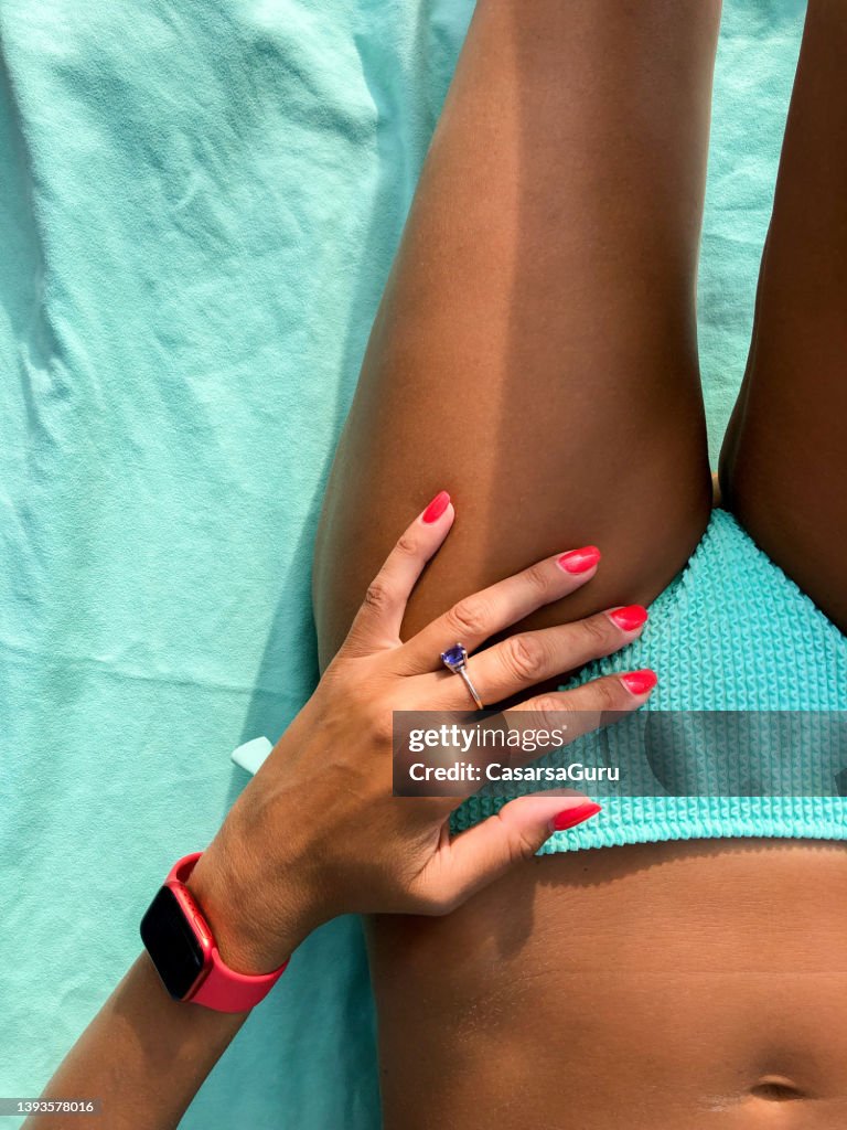 Woman sunbathing on Summer vacation