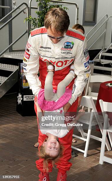 Tony Hawk and daughter Kadence Clover Hawk pose at race day for the 34th Annual Toyota Pro/Celebrity Race at the Long Beach Grand Prix on April 17,...