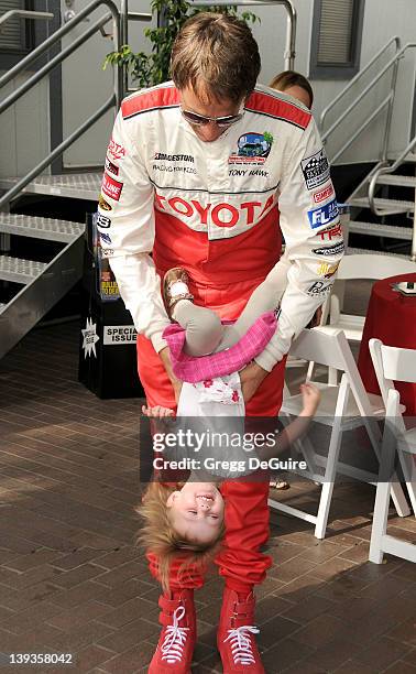 Tony Hawk and daughter Kadence Clover Hawk pose at race day for the 34th Annual Toyota Pro/Celebrity Race at the Long Beach Grand Prix on April 17,...