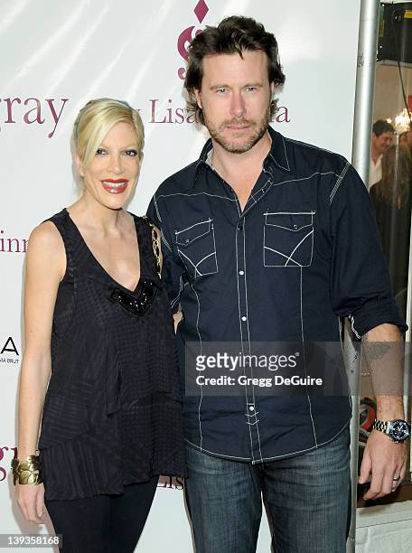 Tori Spelling and Dean McDermott arrive at the 7th Anniversary of Harry Hamlin and Lisa Rinna's boutique, "Belle Grey", February 12, 2010 in Sherman...