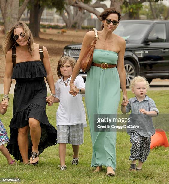 Minnie Driver and son Henry Story Driver arrive at the 22nd Annual A Time for Heroes Celebrity Carnival at the Wadsworth Theater on June 12, 2011 in...
