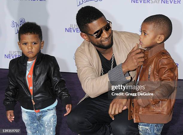 Usher and children arrive at the Los Angeles Premiere of "Justin Bieber: Never Say Never" at the Nokia Theater L.A. Live on February 8, 2011 in Los...