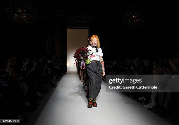 Designer Vivienne Westwood walks the runway with models from her Red Label show as part of London Fashion Week Autumn/Winter 2012 at My Beautiful...