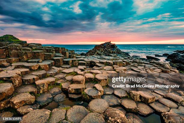 giant's causeway sunset - northern ireland coast stock pictures, royalty-free photos & images
