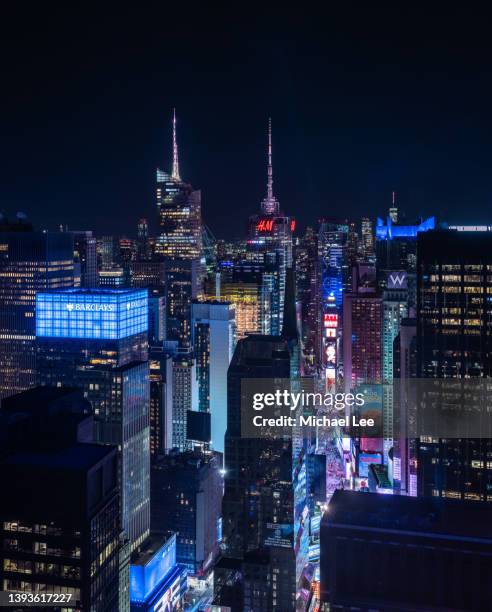 high angle night view of times square in new york - north america at night stock pictures, royalty-free photos & images