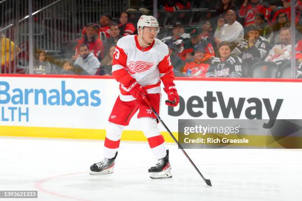 Adam Erne of the Detroit Red Wings skates during the game against the New Jersey Devils on April 24, 2022 at the Prudential Center in Newark, New...