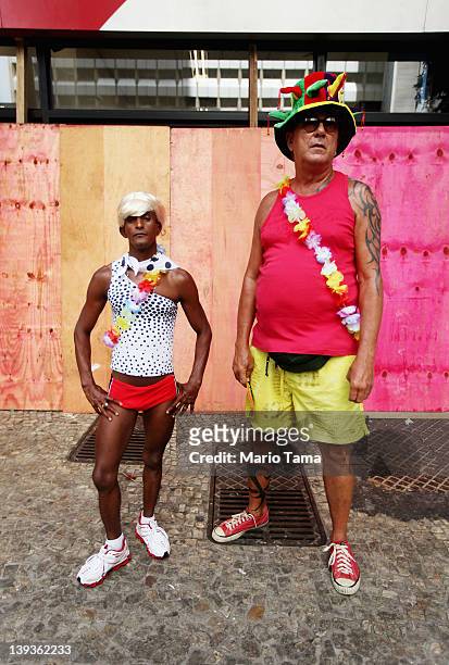 Couple poses during Carnival celebrations on February 19, 2012 in Rio de Janeiro, Brazil. Carnival is the grandest holiday in Brazil, annually...