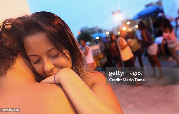 Brazilian lovers embrace during Carnival celebrations on February 19, 2012 in Rio de Janeiro, Brazil. Carnival is the grandest holiday in Brazil,...