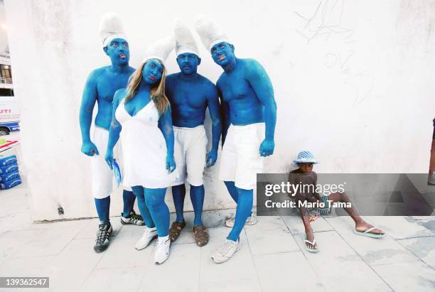 Brazilian revelers pose during Carnival celebrations on February 19, 2012 in Rio de Janeiro, Brazil. Carnival is the grandest holiday in Brazil,...