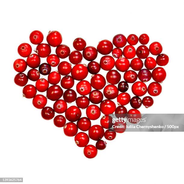 berry heart,red on a white background - cranberry heart stock pictures, royalty-free photos & images