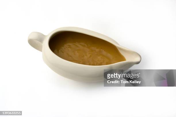 gravy boat with gravy - gravy stock pictures, royalty-free photos & images