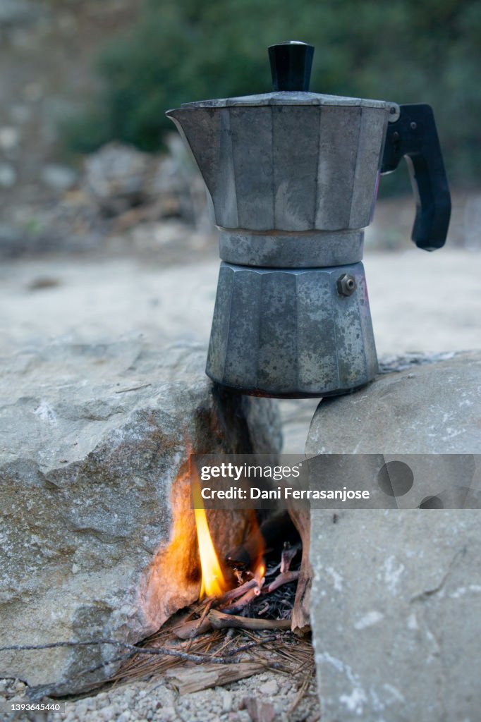 Italian Coffee Pot Brewing On A Camping Trip High-Res Stock Photo