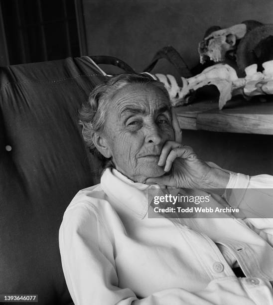 Portrait of American artist Georgia O'Keeffe , her hand on her chin, as she sits in her home, Ghost Ranch, New Mexico, 1963.