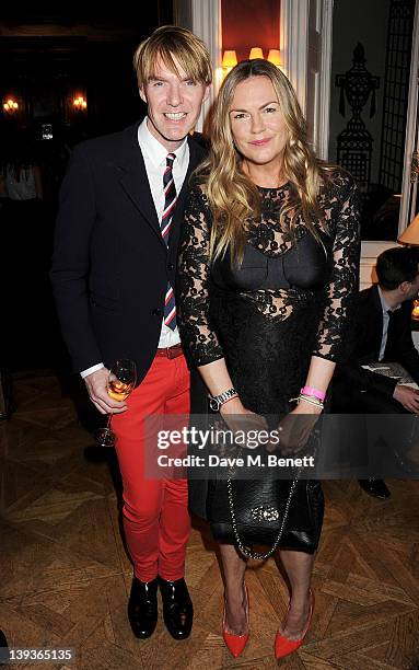 Ken Downing and designer Emma Hill attend a dinner following the Mulberry Autumn/Winter 2012 show during London Fashion Week at The Savile Club on...