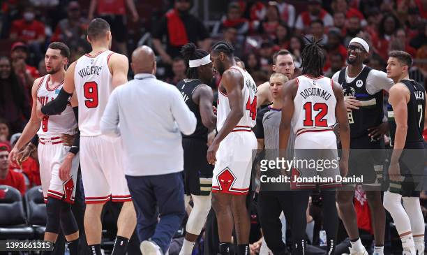 Brief altercation between Zach LaVine of the Chicago Bulls and Bobby Portis of the Milwaukee Bucks is broken up in the second half during Game Four...