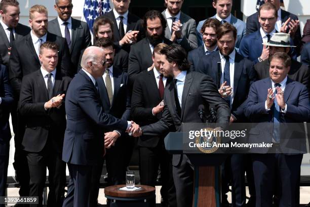 President Joe Biden shakes hands with Tampa Bay Lighting Alternate Captain Ryan McDonagh at an event honoring the teams 2020 and 2021 Stanley Cup...