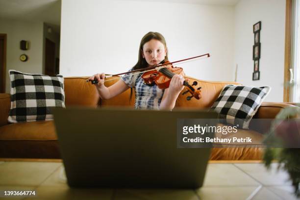 at home - young violinist stock pictures, royalty-free photos & images