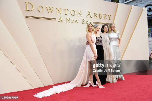 Laura Carmichael, Elizabeth McGovern, Michelle Dockery and Anna Robbins attend the world premiere of "Downton Abbey: A New Era" at Cineworld...