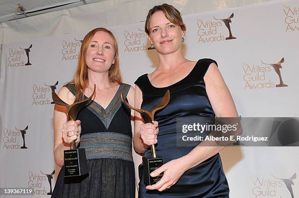 Katie Galloway and Kelly Duane de la Vega pose with their award for outstanding writing in a documentary screenplay for "Better This World" in the...