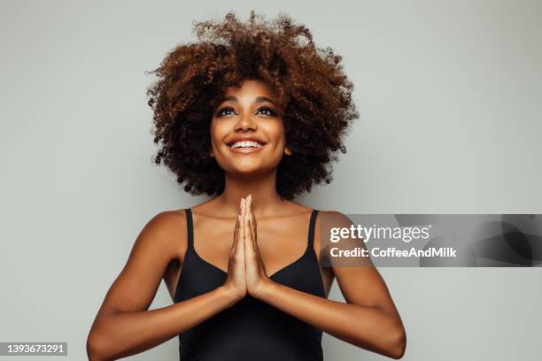 beautiful emotional afro woman with perfect make-up - wishful skin imagens e fotografias de stock