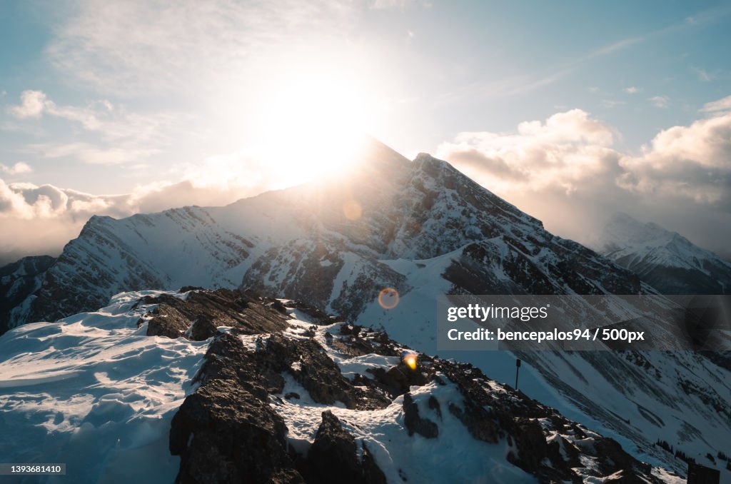 Ha Ling Peak,Scenic view of snowcapped mountains against sky during sunset,Canada