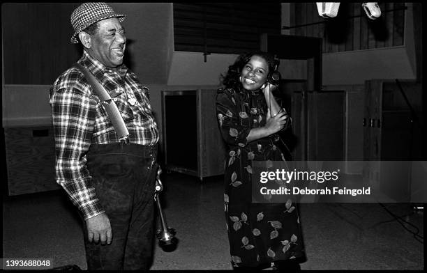 Deborah Feingold/Corbis via Getty Images) American Jazz musician Dizzy Gillespie and Pop and R&B singer Chaka Khan share a laugh during a recording...