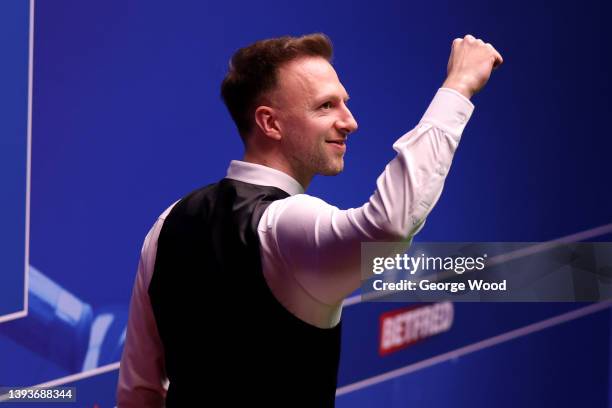Judd Trump of England celebrates after victory in the Betfred World Snooker Championship Round Two match between Judd Trump of England and Anthony...