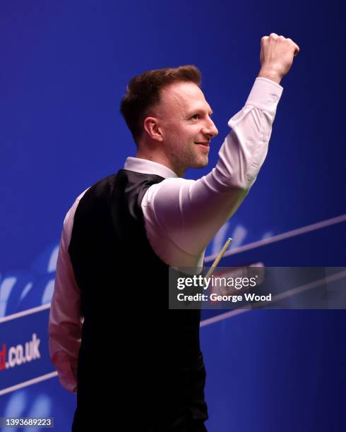 Judd Trump of England celebrates after victory in the Betfred World Snooker Championship Round Two match between Judd Trump of England and Anthony...