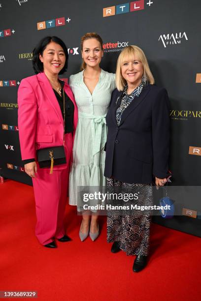 Higuchi-Zitzmann, Judith Gerlach and Patricia Riekel attend the "Herzogpark" Premiere at Gloria Palast on April 25, 2022 in Munich, Germany.