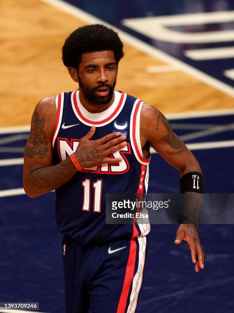 Kyrie Irving of the Brooklyn Nets reacts in the first half against the Boston Celtics during Game Four of the Eastern Conference First Round Playoffs...