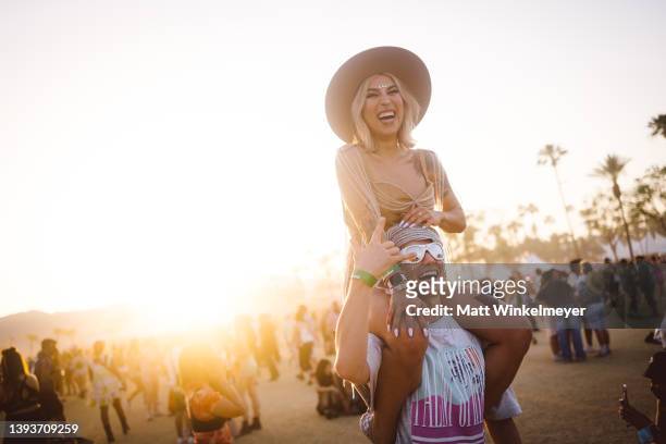 Festival goers attend the 2022 Coachella Valley Music and Arts Festival on April 24, 2022 in Indio, California.