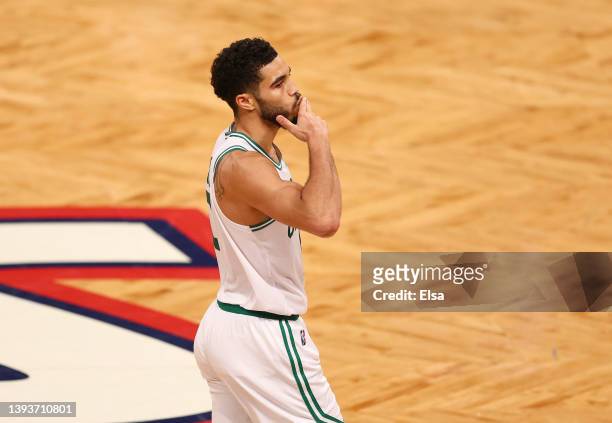 Jayson Tatum of the Boston Celtics celebrates his shot in the third quarter against the Brooklyn Nets during Game Four of the Eastern Conference...