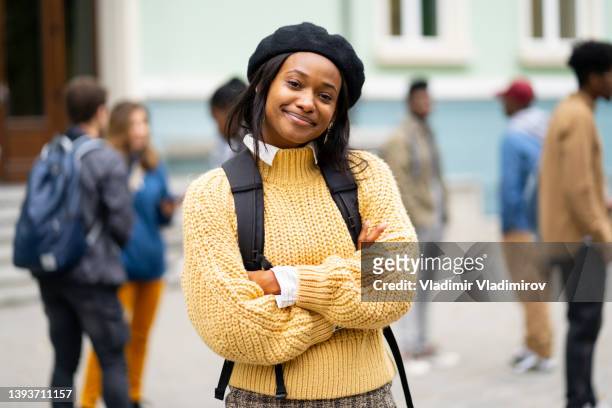 confident african-american student looking at camera - girl arms crossed stock pictures, royalty-free photos & images