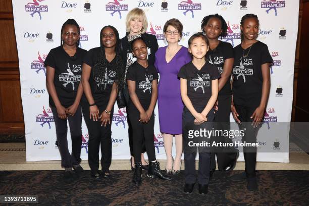 Figure skater JoJo Starbuck and Sharon Cohen pose with students at the Figure Skating in Harlem 25th Anniversary Gala at Gotham Hall on April 25,...