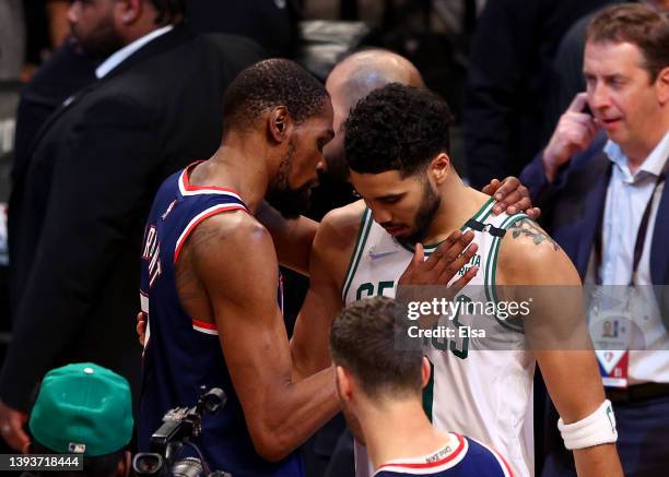 Kevin Durant of the Brooklyn Nets congratulates Jayson Tatum of the Boston Celtics after Game Four of the Eastern Conference First Round Playoffs...