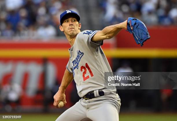 Walker Buehler of the Los Angeles Dodgers delivers a first inning pitch against the Arizona Diamondbacks at Chase Field on April 25, 2022 in Phoenix,...