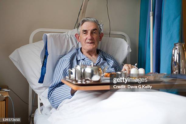 elderly man in hospital ward - hospital food stock pictures, royalty-free photos & images