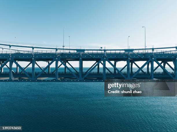 cross-sea bridge - bridge side view stock pictures, royalty-free photos & images