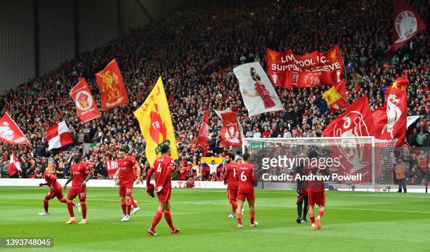Fans of Liverpool before the Premier League match between Liverpool and Everton at Anfield on April 24, 2022 in Liverpool, England.
