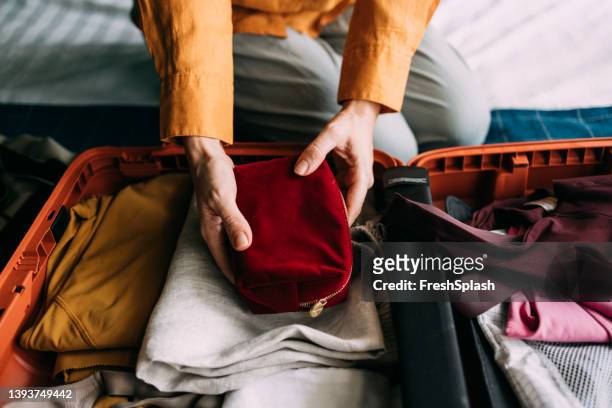 Red Luggage Open Photos and Premium High Res Pictures - Getty Images