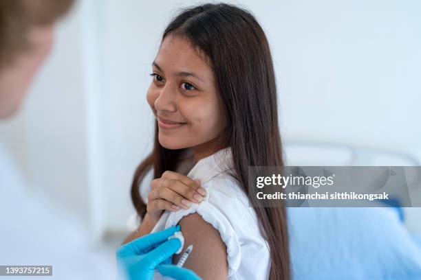 Happy Injection Girl Arm Injection Photos and Premium High Res Pictures - Getty Images