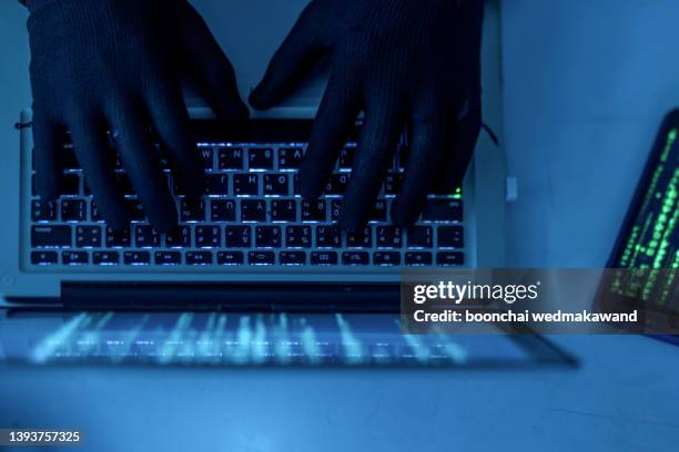 hacker using laptop. - identity theft stockfoto's en -beelden