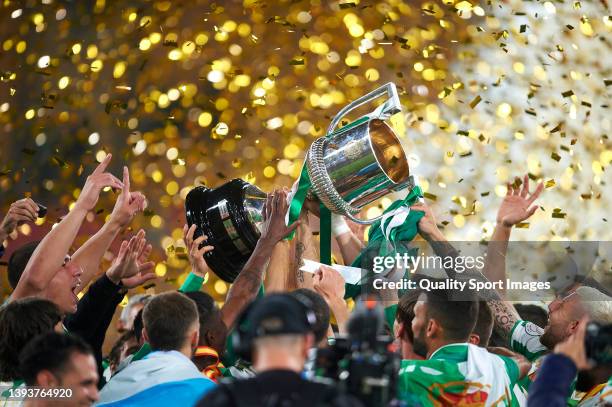 Players of Real Betis celebrate victory with the Copa del Rey trophy after the Copa del Rey final match between Real Betis and Valencia CF at Estadio...