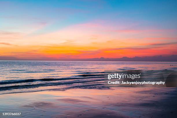 beautiful sunset sea landscape. colorful ocean beach sunrise. beautiful beach scenery with calm waves and soft sandy beach. empty tropical landscape, horizon with scenic coast view. colorful nature sea sky - hawaii seascape stock pictures, royalty-free photos & images