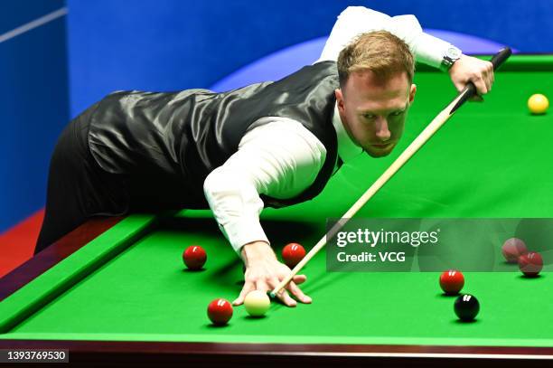 Judd Trump of England plays a shot in the second round match against Anthony McGill of Scotland on day ten of the 2022 Betfred World Snooker...