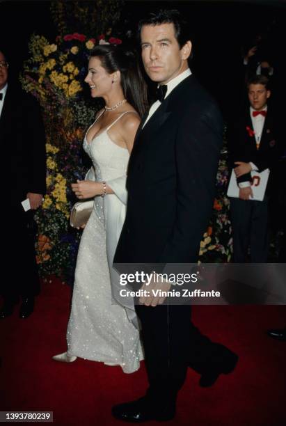 American journalist Keely Shaye Smith and her partner, Irish actor Pierce Brosnan attend the 68th Academy Awards, held at the Dorothy Chandler...
