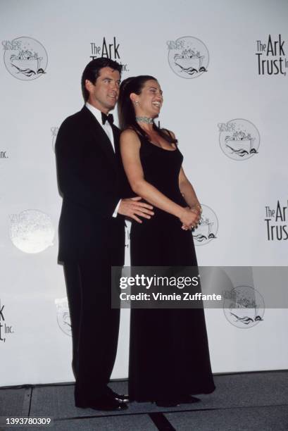 Irish actor Pierce Brosnan and his partner, American journalist Keely Shaye Smith in the press room of the Ark Trust's 10th Annual Genesis Awards,...