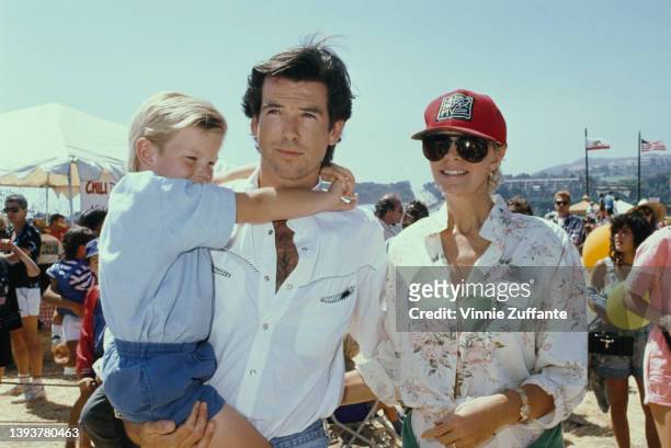 Irish actor Pierce Brosnan, carrying his son Sean, with his wife, Australian actress Cassandra Harris , at the 8th Annual Malibu Kiwanis Chili...